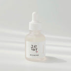 dropper bottle of Glow Deep Rice + Alpha-Arbutin Serum 