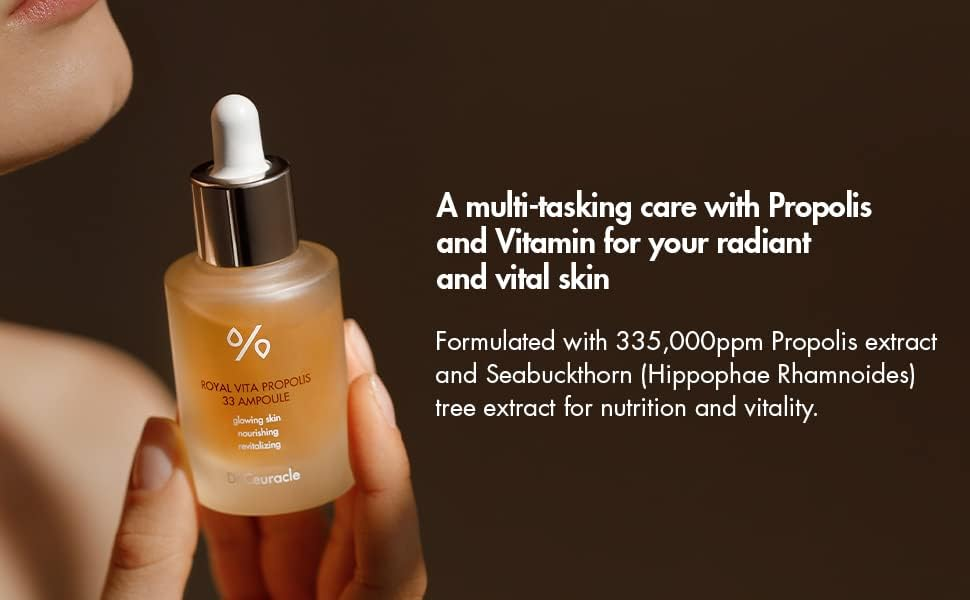 hand holding Dr.Ceuracle Royal Vita Propolis 33 Ampoule