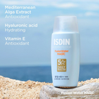 ISDIN Fusion Water Magic SPF50 50mL bottle on a rock