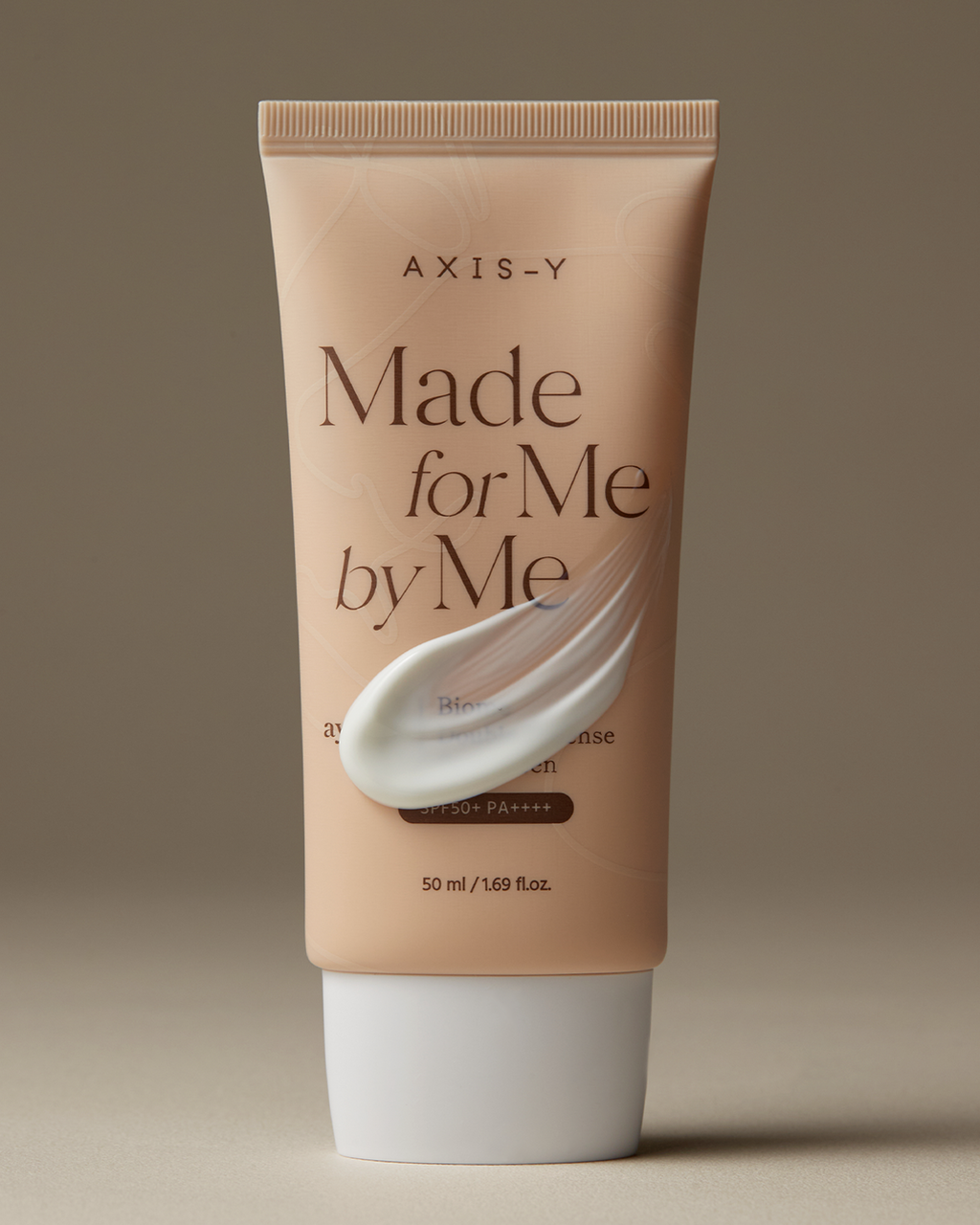 AXIS-Y Biome Double Defense Sunscreen tube with product swatch