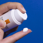 LA ROCHE-POSAY Anthelios Age-Correct SPF50+ 50mL pumped out on finger