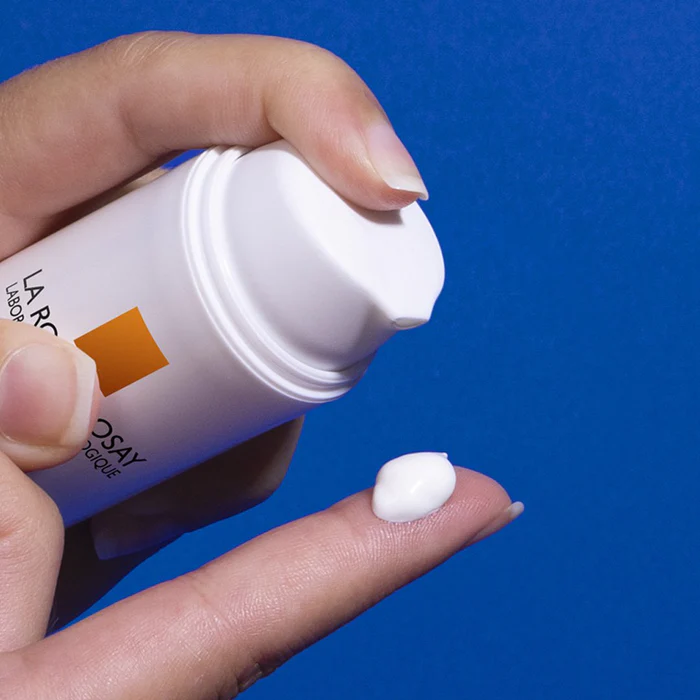 LA ROCHE-POSAY Anthelios Age-Correct SPF50+ 50mL pumped out on finger