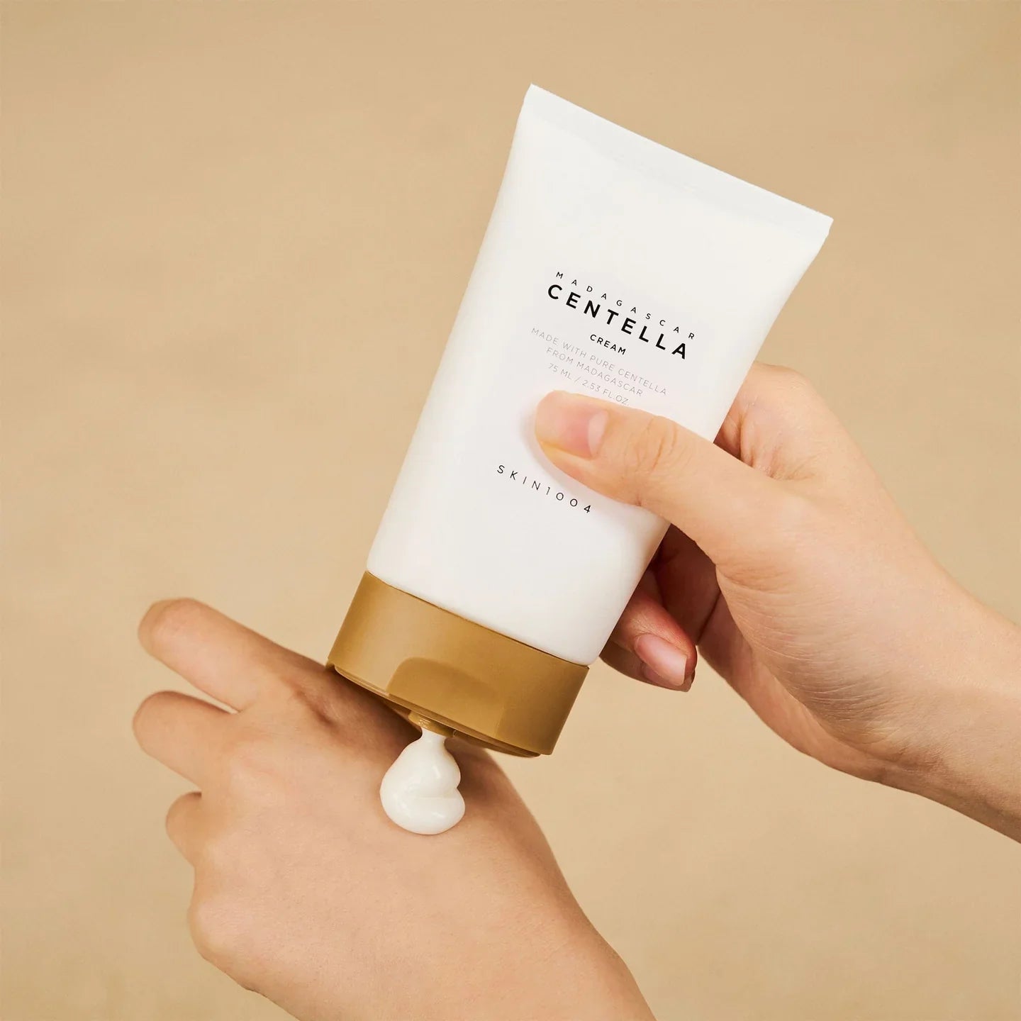SKIN1004 Moisturizing Face Cream dispensed out on hand